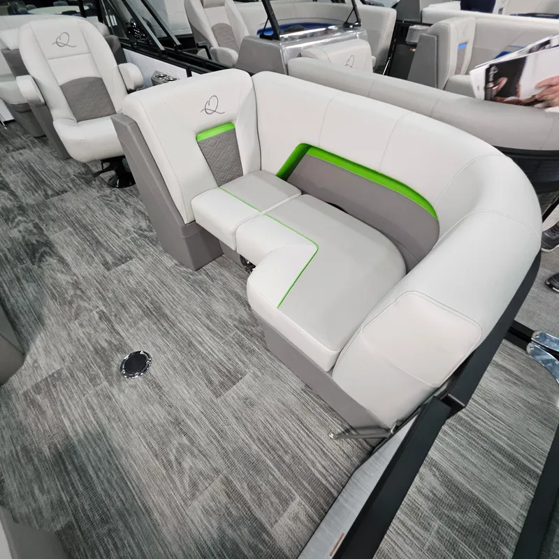Slide: The Image of 2025 Qwest E 18 RLS boat interior with modern seating and stylish design. - 3
