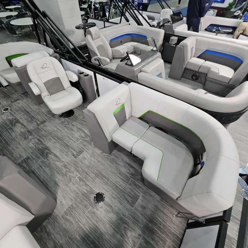 Slide: The Image of 2025 Qwest E 18 RLS boat interior with modern seating and sleek design. - 6