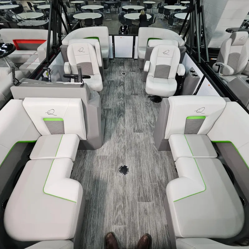 Slide: The Image of 2025 Qwest E 18 RLS boat interior with modern seating and sleek design. - 7