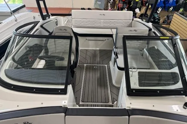 Slide: The Image of 2025 Sea Ray SPX 210 boat interior with sleek seating and modern design. - 3