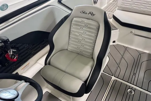 Slide: The Image of Captain's seat in 2025 Sea Ray SPX 210 boat, featuring sleek design and modern upholstery. - 5