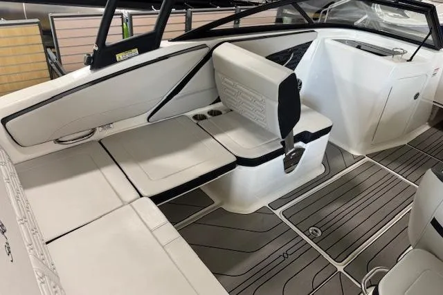 Slide: The Image of 2025 Sea Ray SPX 210 boat interior with sleek seating and modern design. - 6
