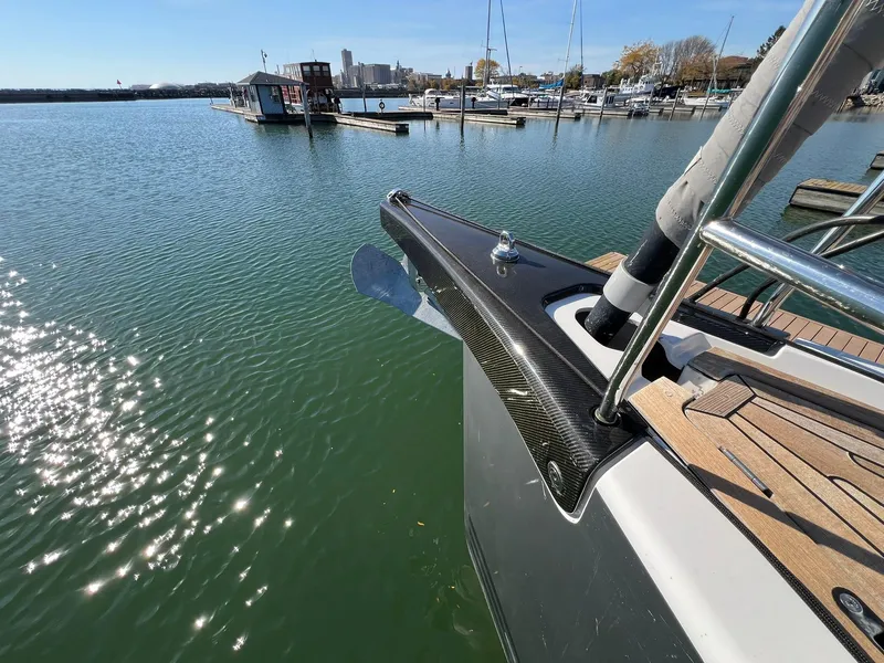 Slide: The Image of Xp 55 yacht by X-Yachts, 2015 model, docked in a serene marina setting. - 11