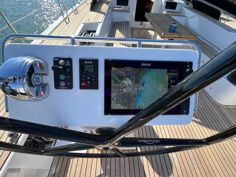 Slide: The Image of Helm of 2015 X-Yachts Xp 55 with navigation display and controls. - 16