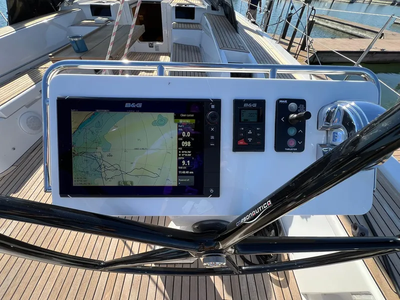 Slide: The Image of 2015 X-Yachts Xp 55 yacht cockpit with navigation display and controls. - 17