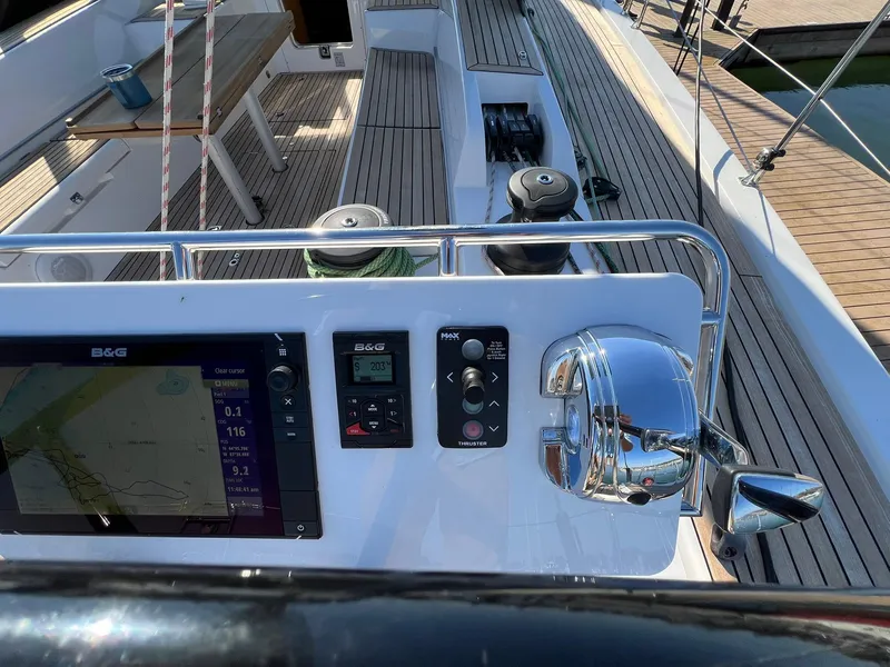 Slide: The Image of Cockpit of 2015 X-Yachts Xp 55 sailboat with navigation controls and display. - 18