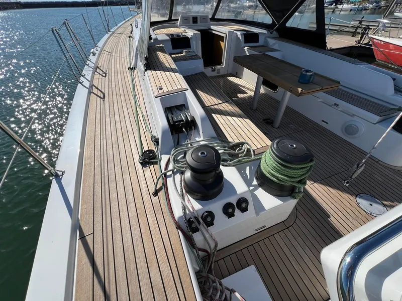 Slide: The Image of 2015 X-Yachts Xp 55 sailboat deck with winches and seating area. - 35