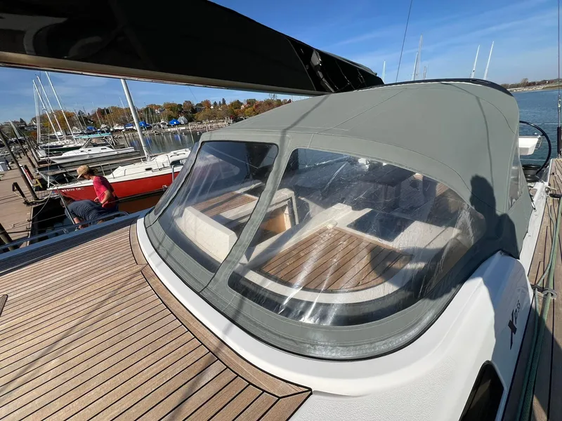 Slide: The Image of 2015 X-Yachts Xp 55 sailboat with sleek design, docked at marina. - 37