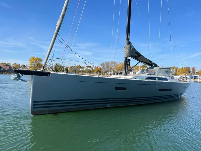 Slide: The Image of 2015 X-Yachts Xp 55 sailboat on calm water, clear sky background. - 4