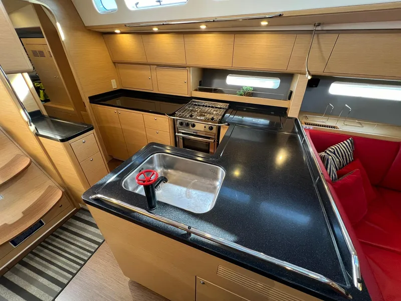 Slide: The Image of Luxurious 2015 X-Yachts Xp 55 yacht interior with modern kitchen and sleek design. - 44