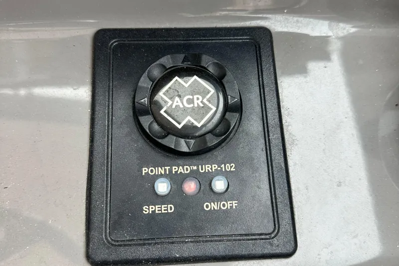 Slide: The Image of Control panel of a 2019 Pursuit DC 325 boat with ACR Point Pad URP-102. - 8