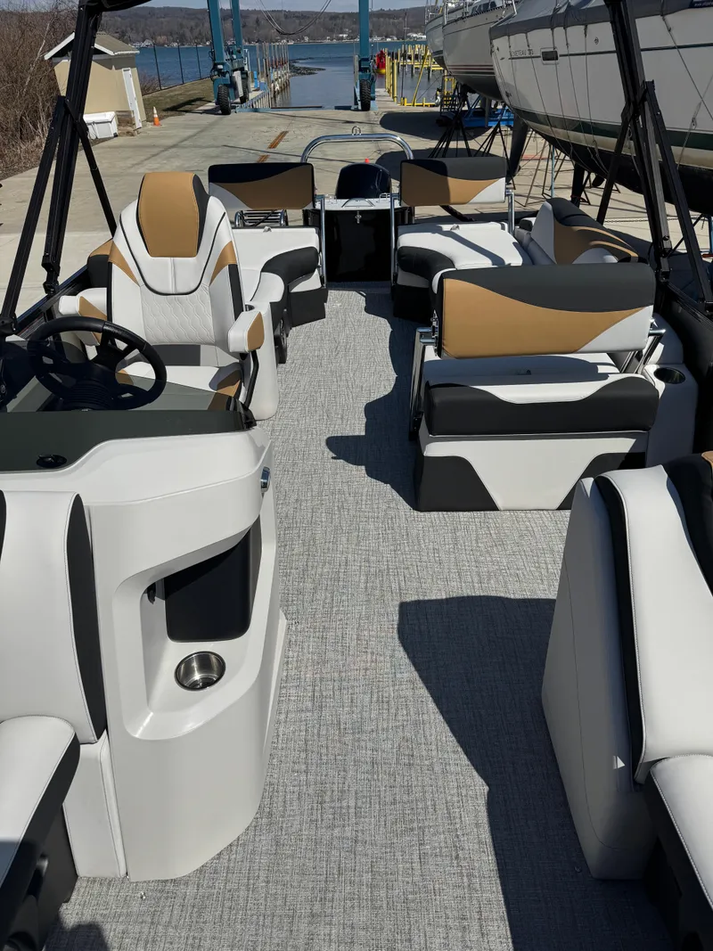 Slide: The Image of 2025 Tahoe Pontoon LTZ Quad Lounger Shift with luxurious seating and modern design. - 12