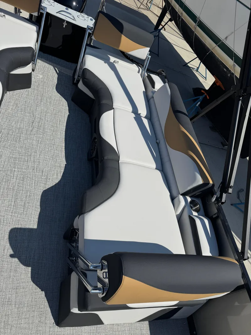 Slide: The Image of 2025 Tahoe Pontoon LTZ Quad Lounger Shift with stylish seating and modern design. - 14