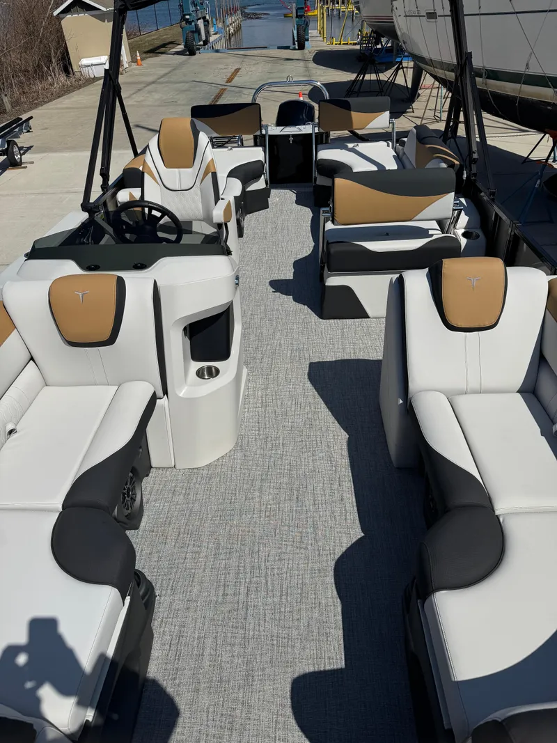Slide: The Image of 2025 Tahoe Pontoon LTZ Quad Lounger Shift with luxurious seating and modern design. - 15
