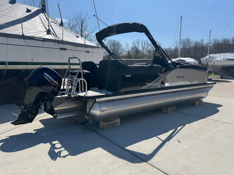Slide: The Image of 2025 Tahoe Pontoon LTZ Quad Lounger Shift on display outdoors. - 3