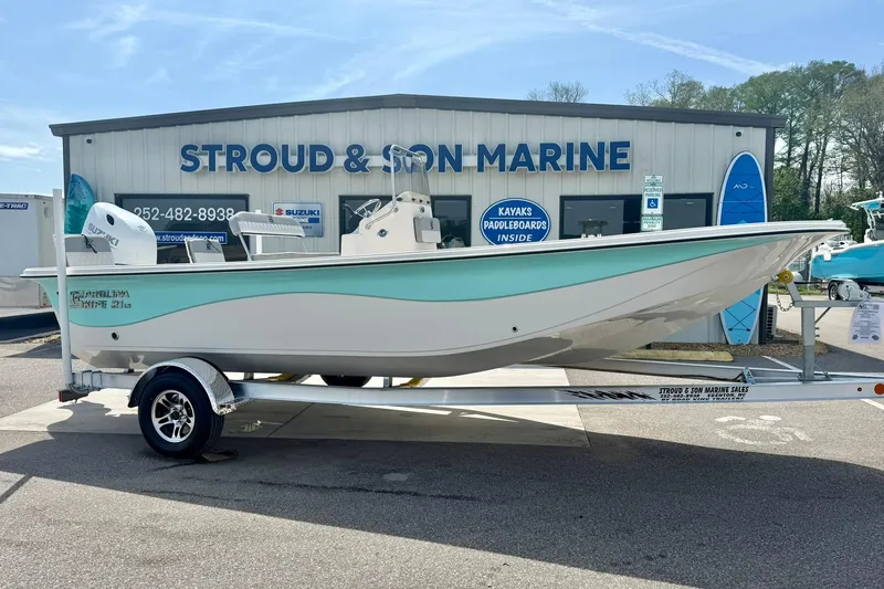 The Image of 2025 Carolina Skiff 21 LS boat on trailer at Stroud & Son Marine dealership. - 1