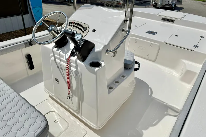 Slide: The Image of 2025 Carolina Skiff 21 LS boat interior with steering console and seating. - 17