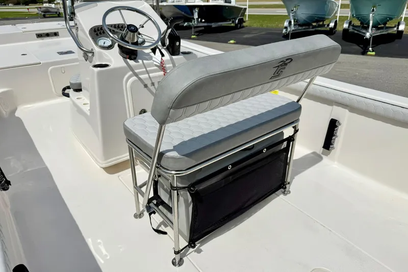 Slide: The Image of 2025 Carolina Skiff 21 LS boat interior with seating and steering console. - 22