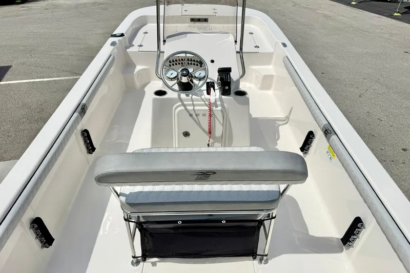 Slide: The Image of 2025 Carolina Skiff 21 LS boat interior with steering console and seating. - 26