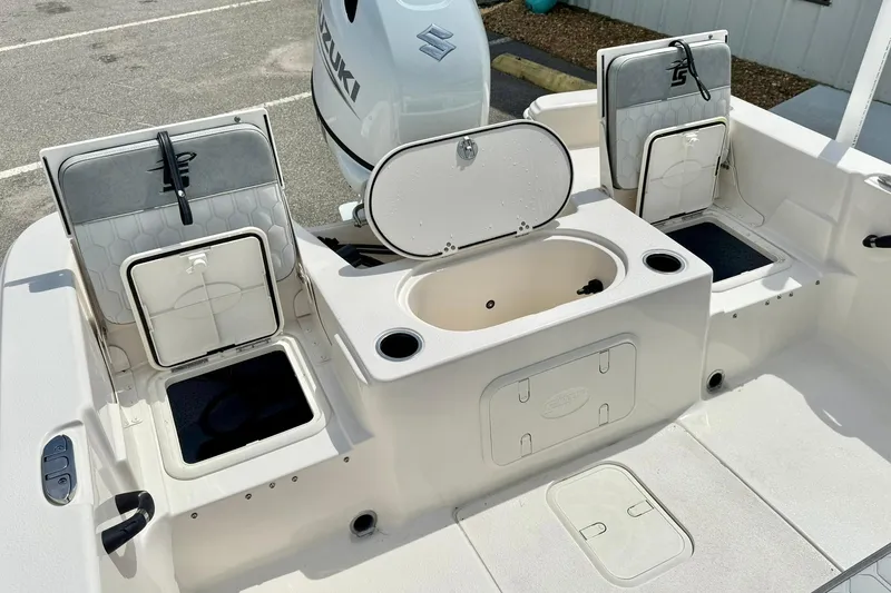 Slide: The Image of 2025 Carolina Skiff 21 LS boat interior with storage compartments and seating. - 31