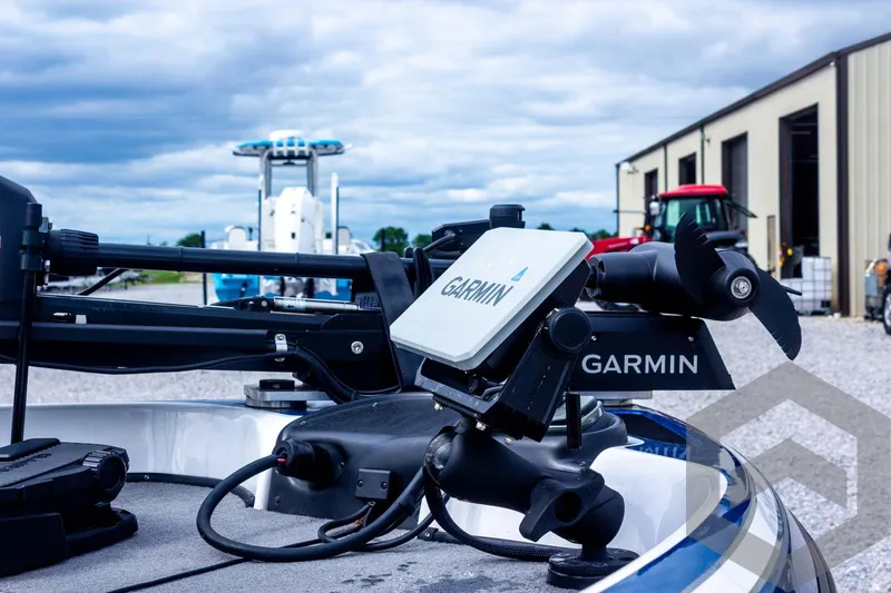 Slide: The Image of 2022 Nitro Z19 Sport boat with Garmin equipment, outdoor setting, cloudy sky. - 20