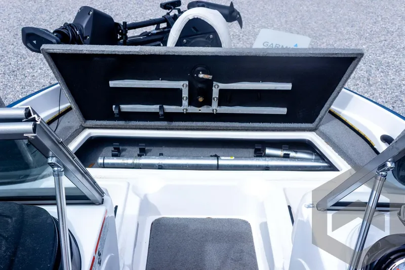 Slide: The Image of 2022 Nitro Z19 Sport boat storage compartment with open lid, showcasing interior space. - 25