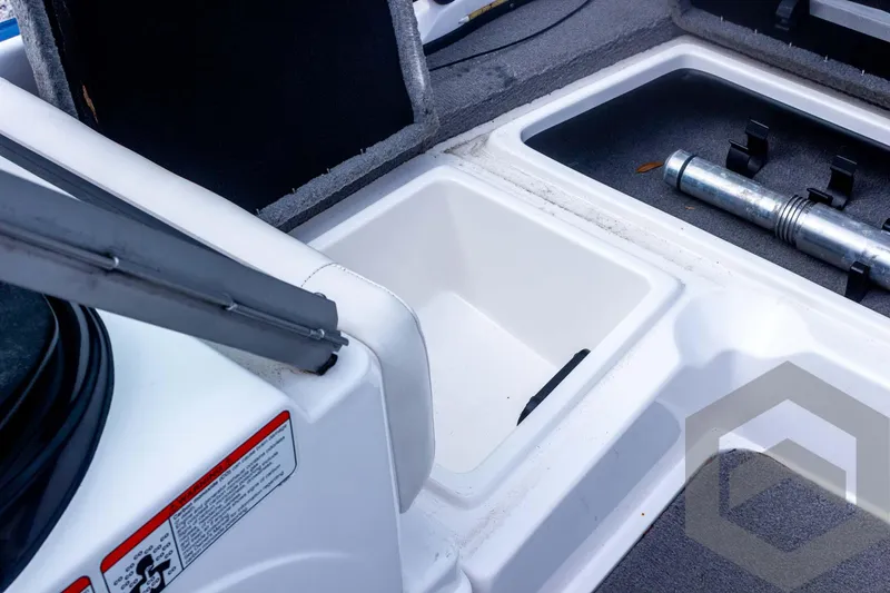 Slide: The Image of 2022 Nitro Z19 Sport boat storage compartments and seating area. - 27