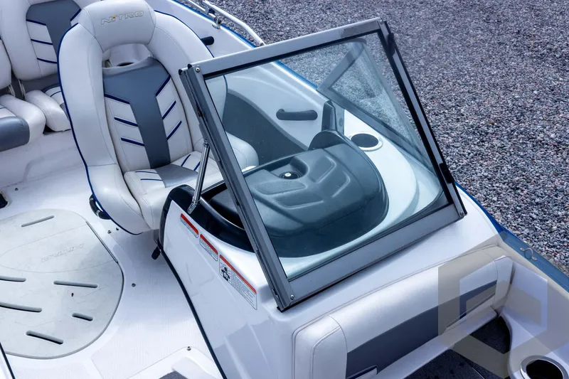 Slide: The Image of 2022 Nitro Z19 Sport boat interior with seating and windshield. - 31
