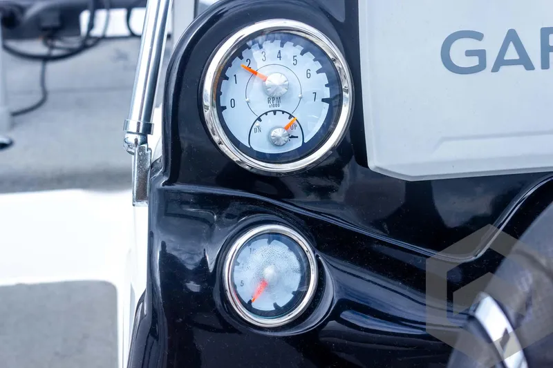 Slide: The Image of Dashboard gauges of 2022 Nitro Z19 Sport boat, featuring RPM and fuel indicators. - 34
