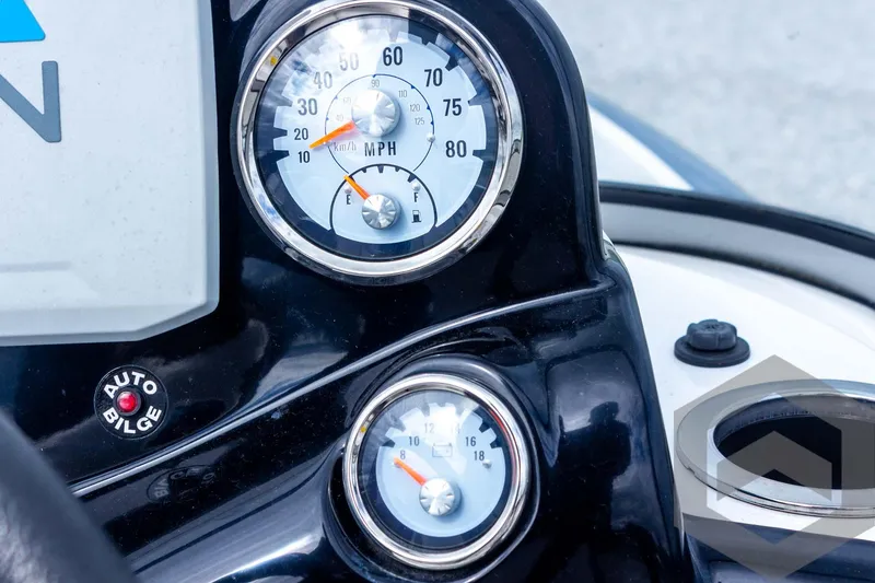 Slide: The Image of Dashboard of 2022 Nitro Z19 Sport boat with speedometer and fuel gauge. - 37