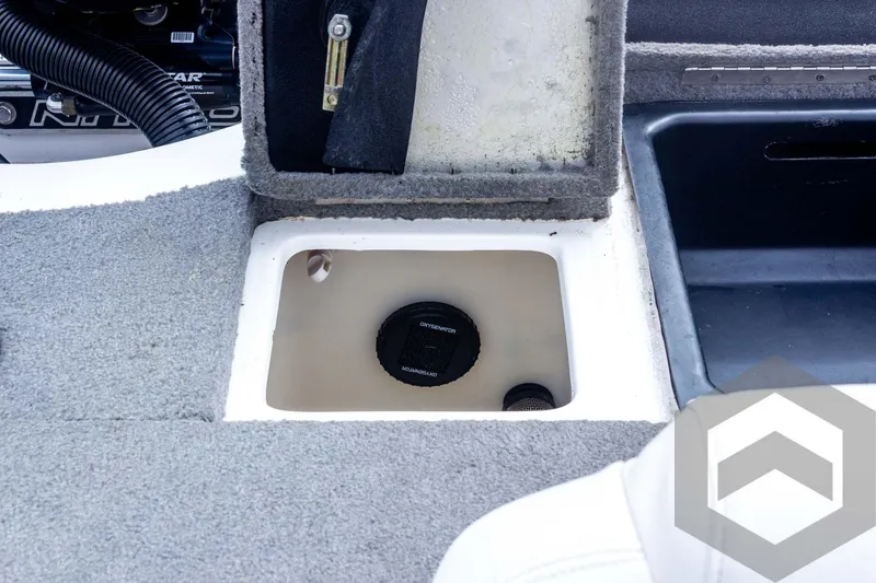 Slide: The Image of 2022 Nitro Z19 Sport boat storage compartment with open lid and visible interior. - 44