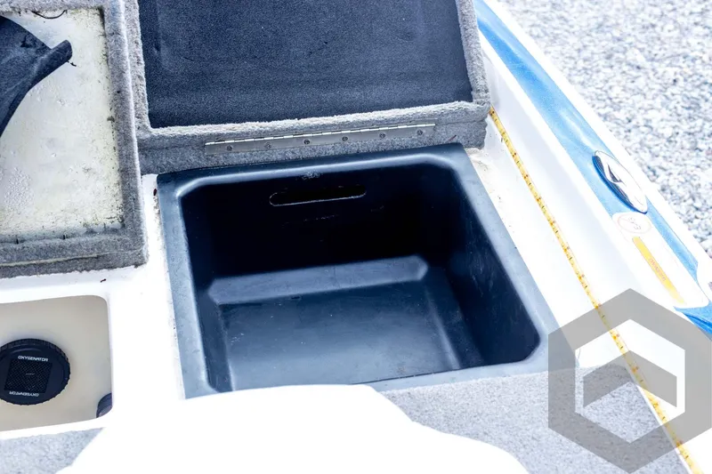 Slide: The Image of Open storage compartment on a 2022 Nitro Z19 Sport boat. - 45