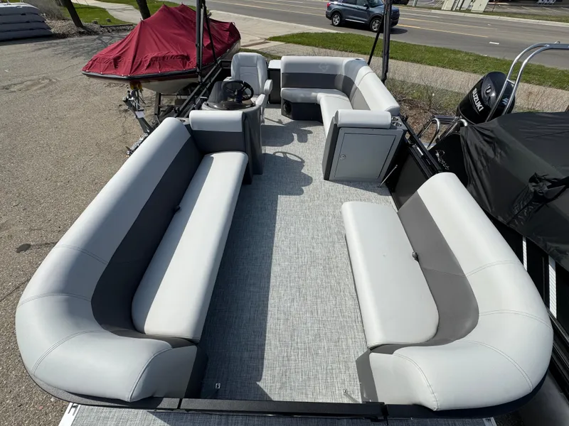 Slide: The Image of 2025 Qwest E 20 Lanai pontoon boat with spacious seating and modern design. - 10