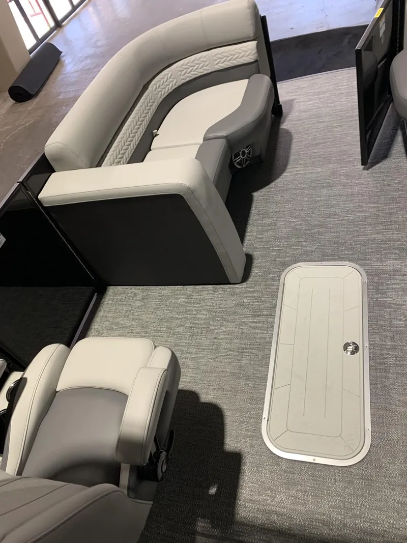 Slide: The Image of 2025 Godfrey Monaco 235 SD interior with plush seating and modern design. - 2