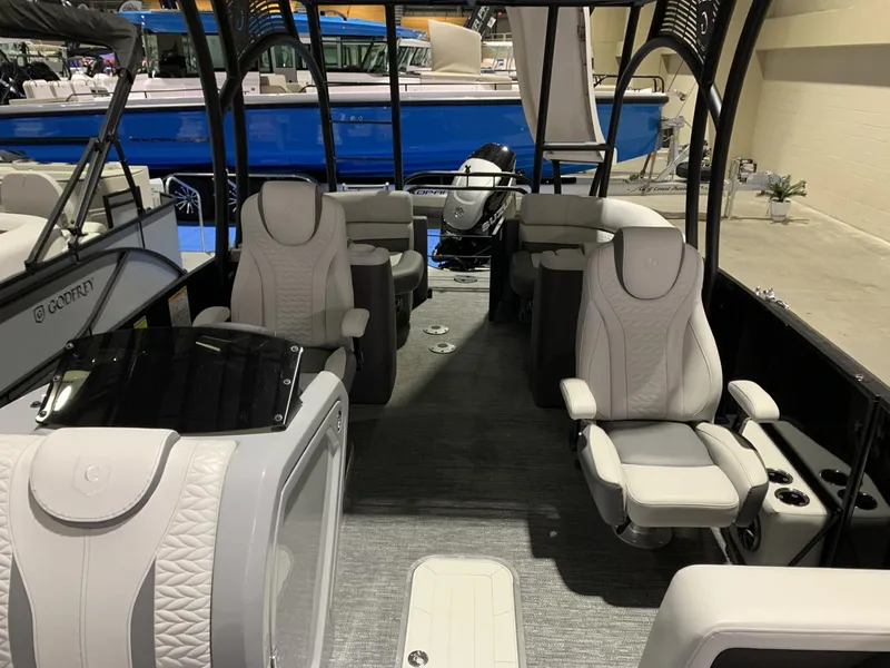 Slide: The Image of 2025 Godfrey Monaco 235 SD boat interior with luxurious seating and modern design. - 6