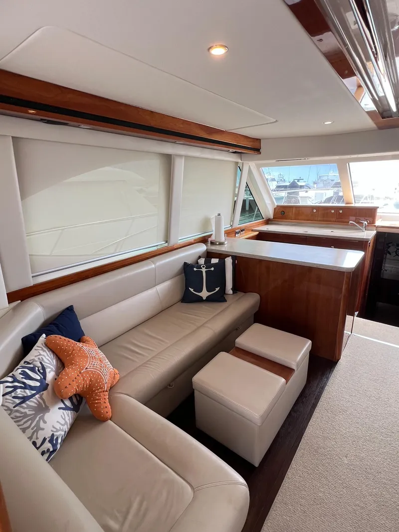 Slide: The Image of Luxurious interior of 2016 Riviera 45 Open Flybridge yacht with elegant seating and decor. - 3