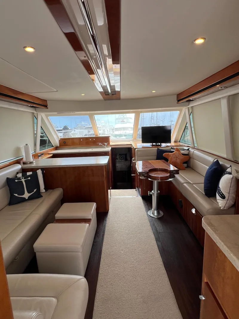 Slide: The Image of Luxurious interior of 2016 Riviera 45 Open Flybridge yacht with elegant seating and modern decor. - 5