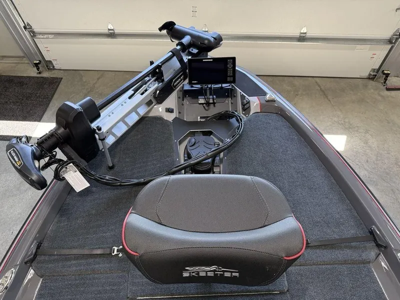 Slide: The Image of 2025 Skeeter ZXR20 boat interior with advanced trolling motor and control panel. - 3