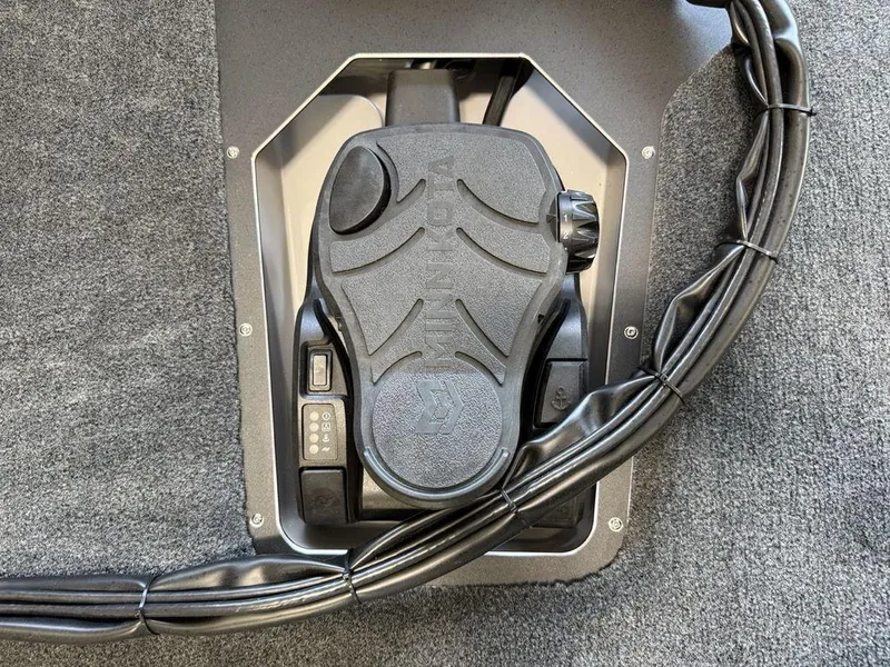 Slide: The Image of Foot pedal control on 2025 Skeeter ZXR20 boat, featuring advanced navigation technology. - 5