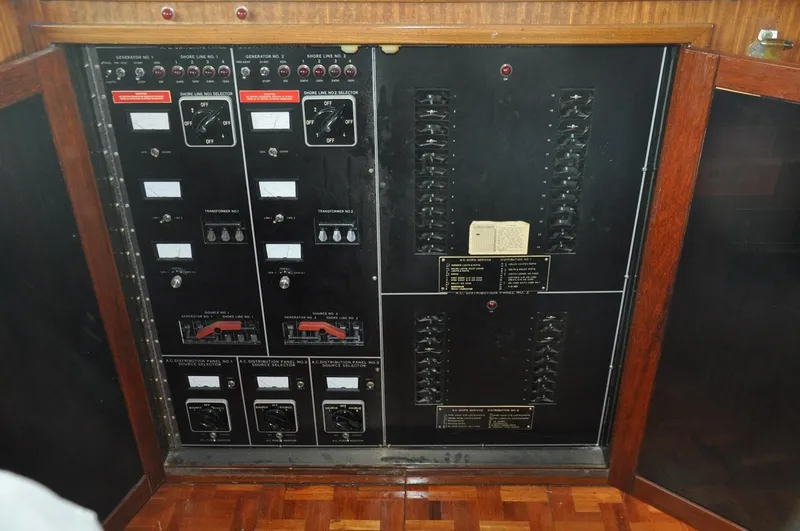 Slide: The Image of Electrical control panel on a 1985 Hatteras 72 Motor Yacht. - 15