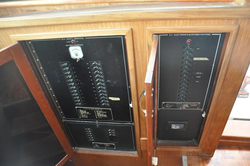 Slide: The Image of Electrical control panels on a 1985 Hatteras 72 Motor Yacht. - 32