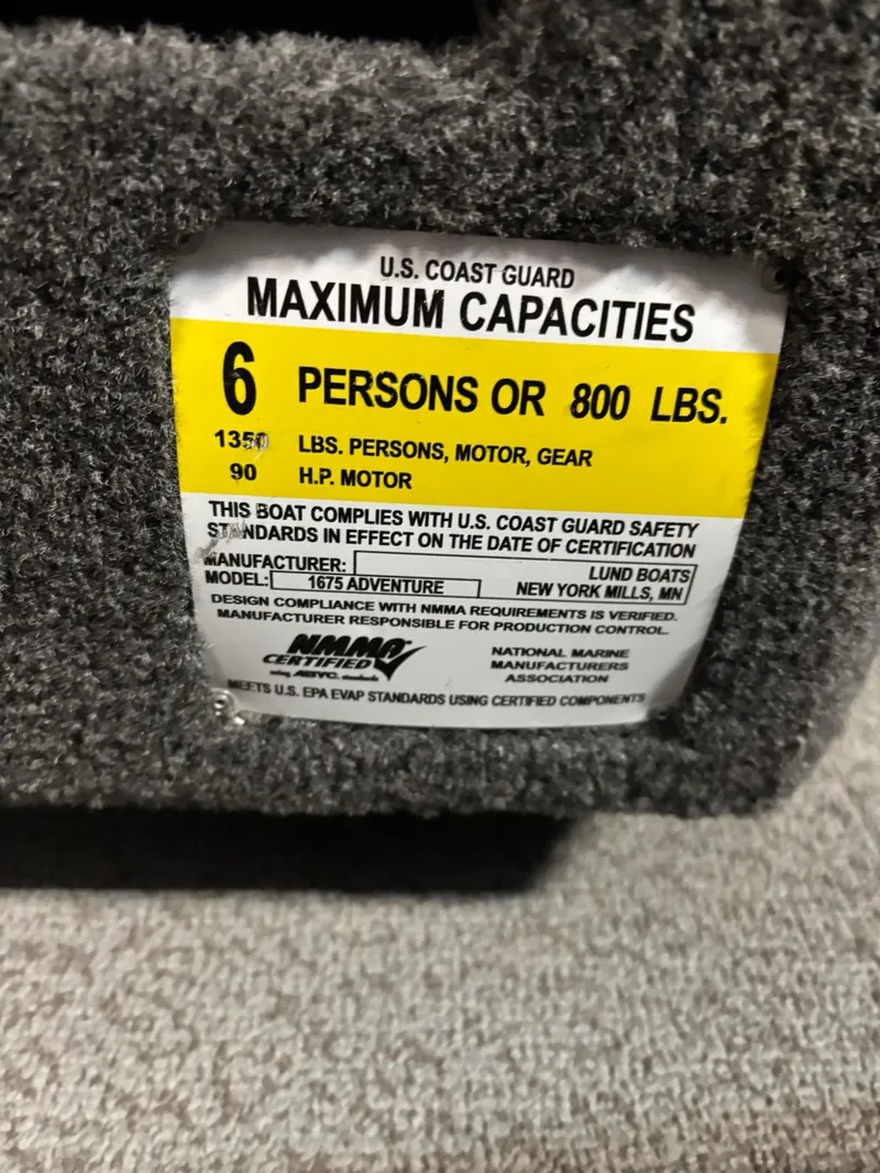 Slide: The Image of 2019 Lund 1675 Adventure Sport capacity label, 6 persons or 800 lbs, 90 HP motor. - 16