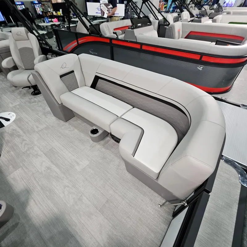 Slide: The Image of 2025 Qwest L 22RLS boat interior with modern seating and sleek design. - 5