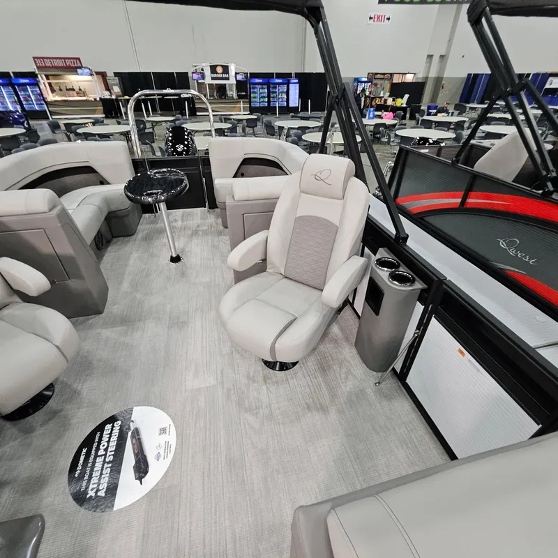 Slide: The Image of 2025 Qwest L 22RLS boat interior with luxurious seating and modern design. - 6