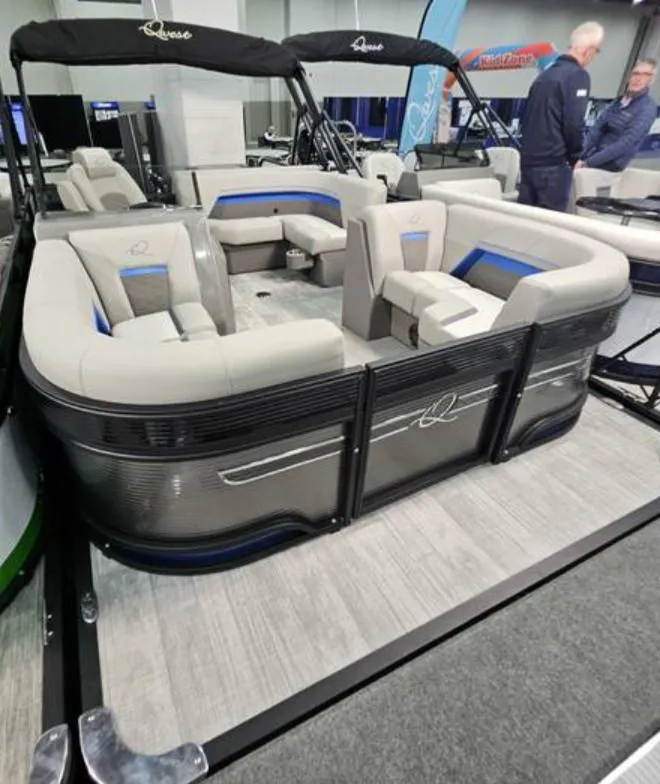 Slide: The Image of 2025 Qwest L18 Lanai pontoon boat with modern seating and sleek design. - 2