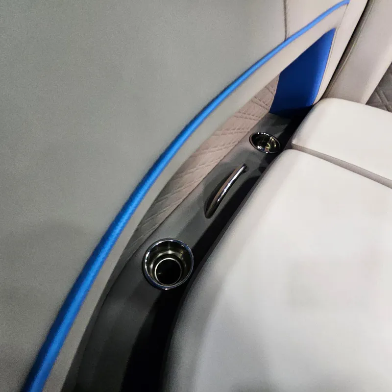 Slide: The Image of Interior of 2025 Qwest L18 Lanai with sleek seating and cup holders. - 20