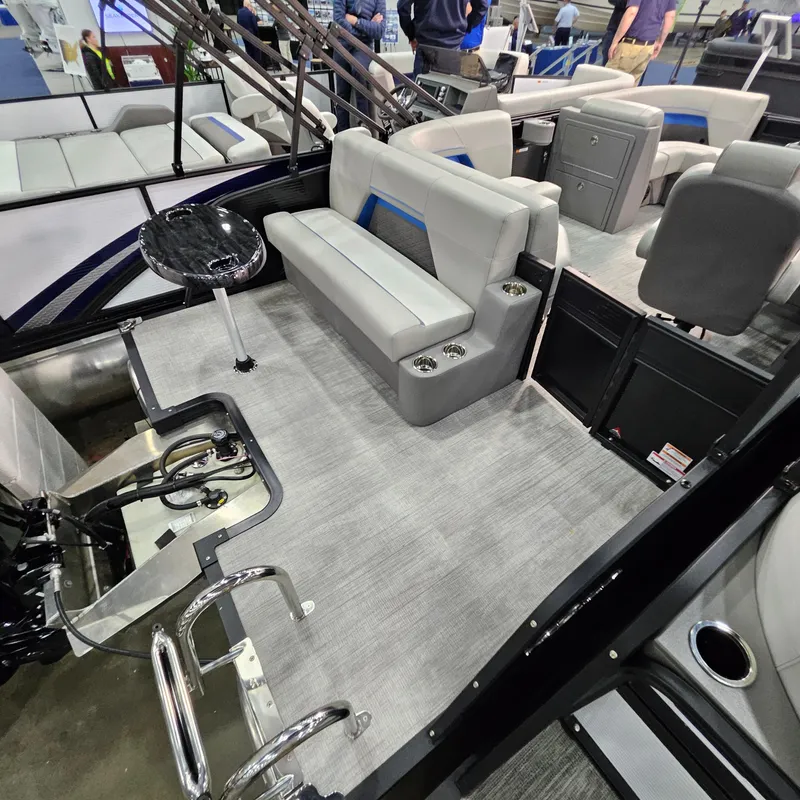 Slide: The Image of 2025 Qwest L18 Lanai boat interior with seating and modern design. - 4
