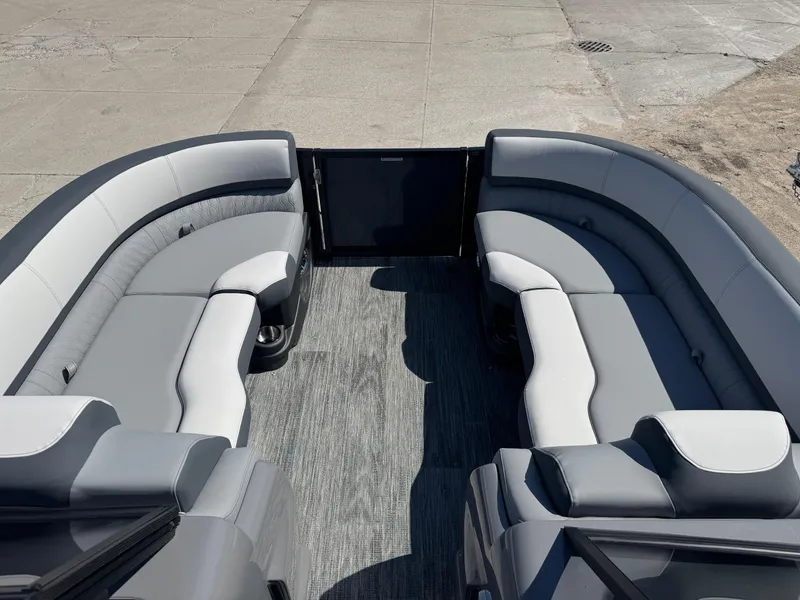 Slide: The Image of 2025 Tahoe Pontoon LTZ Versatile Rear Bench Windshield with spacious seating and modern design. - 10