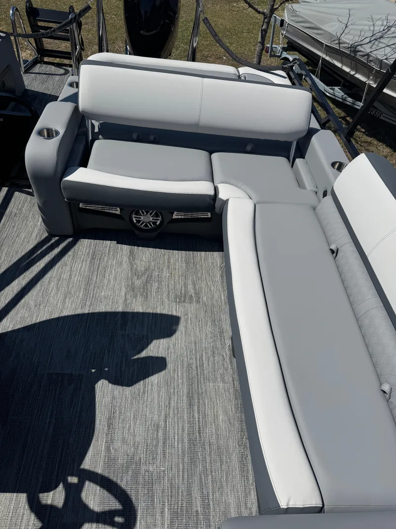 Slide: The Image of 2025 Tahoe Pontoon LTZ Versatile Rear Bench Windshield with plush seating and modern design. - 15