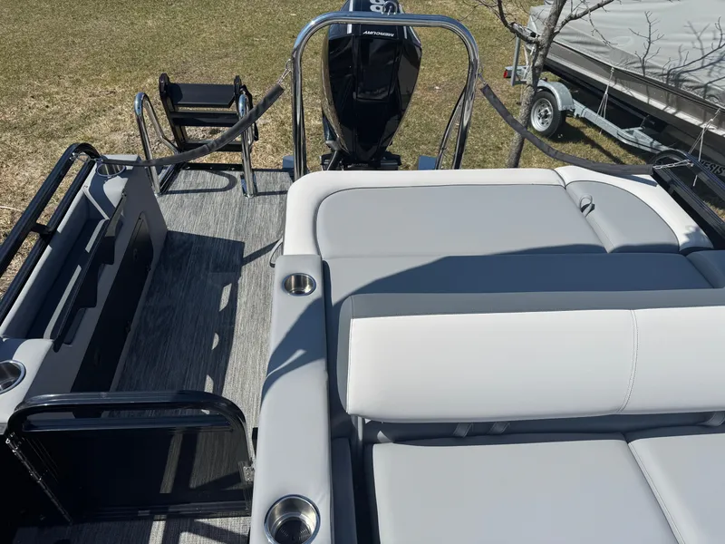 Slide: The Image of 2025 Tahoe Pontoon LTZ Versatile Rear Bench Windshield with sleek seating and modern design. - 16